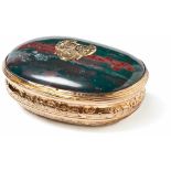 Heliotrope tabatière18th centuryOval shape with chased rocaille decoration, hinged lid with polished