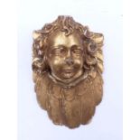 Winged angel's head18th centuryFlat carved plumage, curly putto head in front. Hardwood, carved