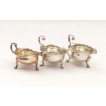 Three sauce boatsLondon, Georg II, Mid. 18th C.Silver, one with emblematic engraving. Hallmarks,
