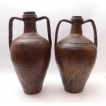 Two oil jugsSouthern Europe, 18th/19th centuryAmphorae with two broad strap handles folded at the