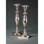 Pair of Biedermeier table candlesticksBerlin, around 1840Above square base the round base with