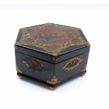 Lacquer box with chinoiserieProbably France, about 1900On ball feet hexagonal corpus with hinged