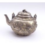 TeapotChinaWith curved spout and movable handle; relief decoration of sea waves with fish and a