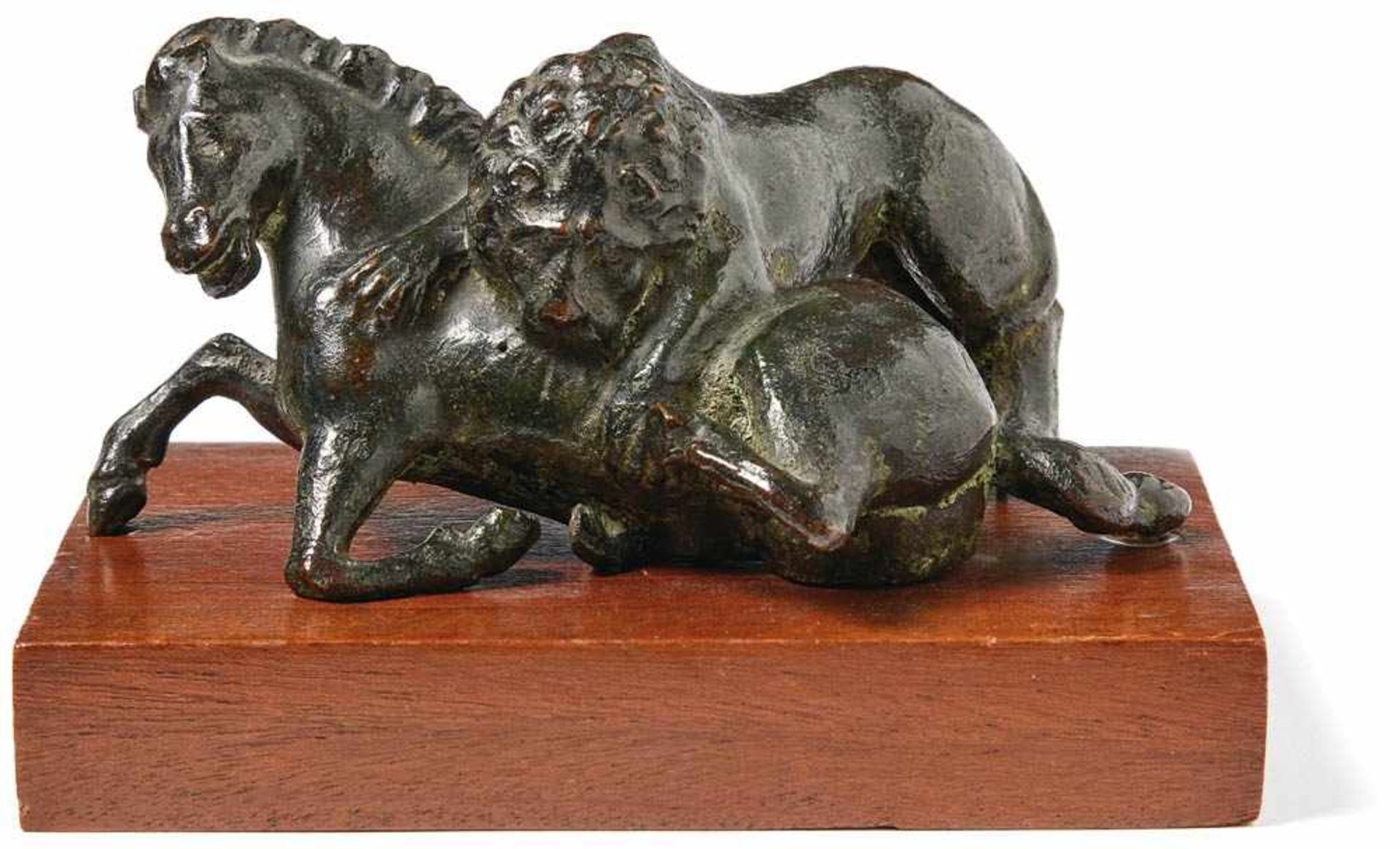Lion, tearing a horseNetherlands, early 17th centuryA fully sculptured group of a lying horse