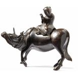 Flute playing boy on water buffaloChina, Qing Dynasty - late 19th c.Two-part group of figures,