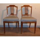 Pair of chairsFrance, around 1900A horseshoe-shaped upholstered seat on conical square legs,