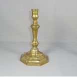 CandlestickEarly 18th C.Gilded brass. H. 24 cm.TafelleuchterA. 18. Jh.Achteckiger, getreppter Sockel