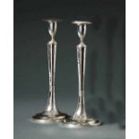 Pair of elegant candlesticksAustria-Hungary, 1821Trumpet foot with flower pendant framed by bands,