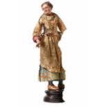 Neapolitan crib figure - Female citizenAround 1800An older woman in a light blue dress with an