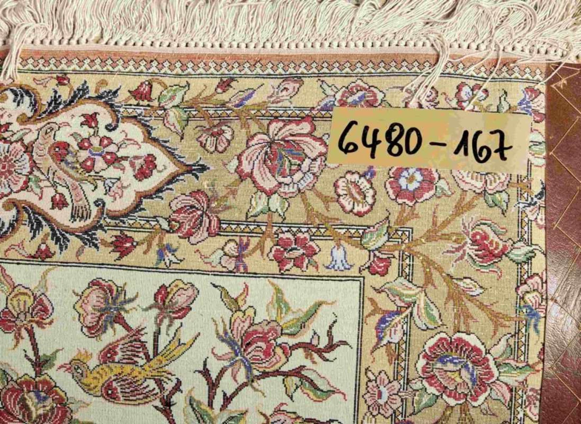 GhomIran, 20th c.In delicate shades of beige, green and red on an ivory ground, border with - Bild 4 aus 4