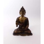 Sitting Buddha in Padmasana with alms bowlBeg. 20th C.Bronze with brown and gold patina. H. 25,5