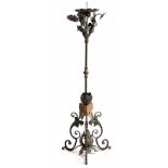 Large wrought-iron candlestickVenice, probably 19th c.Three-pass base made of volutes, decorated