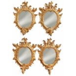 Set of four rococo wall appliquesSouthern Germany, 18th c. and laterThe oval mirror surface in