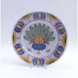 Large plate with fruit bowlKellinghusen, 1st half of the 19th century.Round, deep and smooth form,