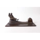 Sculptural inkstandEarly 20th C.Bronze. 14 x 16 x 31 cm.Figürliches TintenzeugA. 20. Jh.