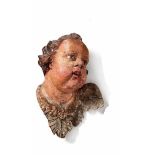 Winged angel's head18th centuryChubby with curly hair. Wood, carved full round and painted. H. 27