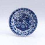 Small decorative plate with floral decorationDelft, 18th c.Flowering bushes in the mirror, two