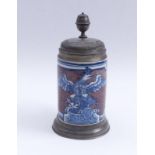 Jug with Prussian eagleBerlin, 18th c.On manganese sprayed background on the front eagle with spread