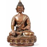 Sitting Gautama BuddhaNepal, 1880-1900Two parts; three-passed lotus base, on it Buddha in an