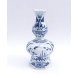 Double pumpkin vase with bird-and-rockDelft, 18th-19th c.On the wall in two reserves Asian landscape