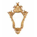 Small giltwood mirrorVenice, 18th C.Hardwood. 52 x 35,5 cm.Kleiner WandspiegelVenedig, 18. Jh.