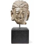 HeadChina, Northern Qi Dynasty - 550-577Carefully parted coiffure with two plaits. Stone. H. 21