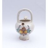 Syrup jug with flower decorationItaly, 19th c.With short tube spout, rear strap handle and bow