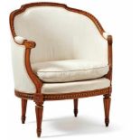 BergèreFrance, circa 1780Oval, carved frame with upholstered seat and inlay cushion on conical,