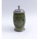 Student Beer MugGermany, circa 1880Ovoid form with C-handle; high relief coat of arms on the front