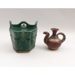 Bucket-shaped water vesselChina, Qing Dynasty, Beg. 20th C.Green glazed ceramic. H. 20,5 cm. - Minor