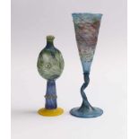 Goblet and oil lamp shaped vase20th C.Colorless and polychrome glass with powder and other