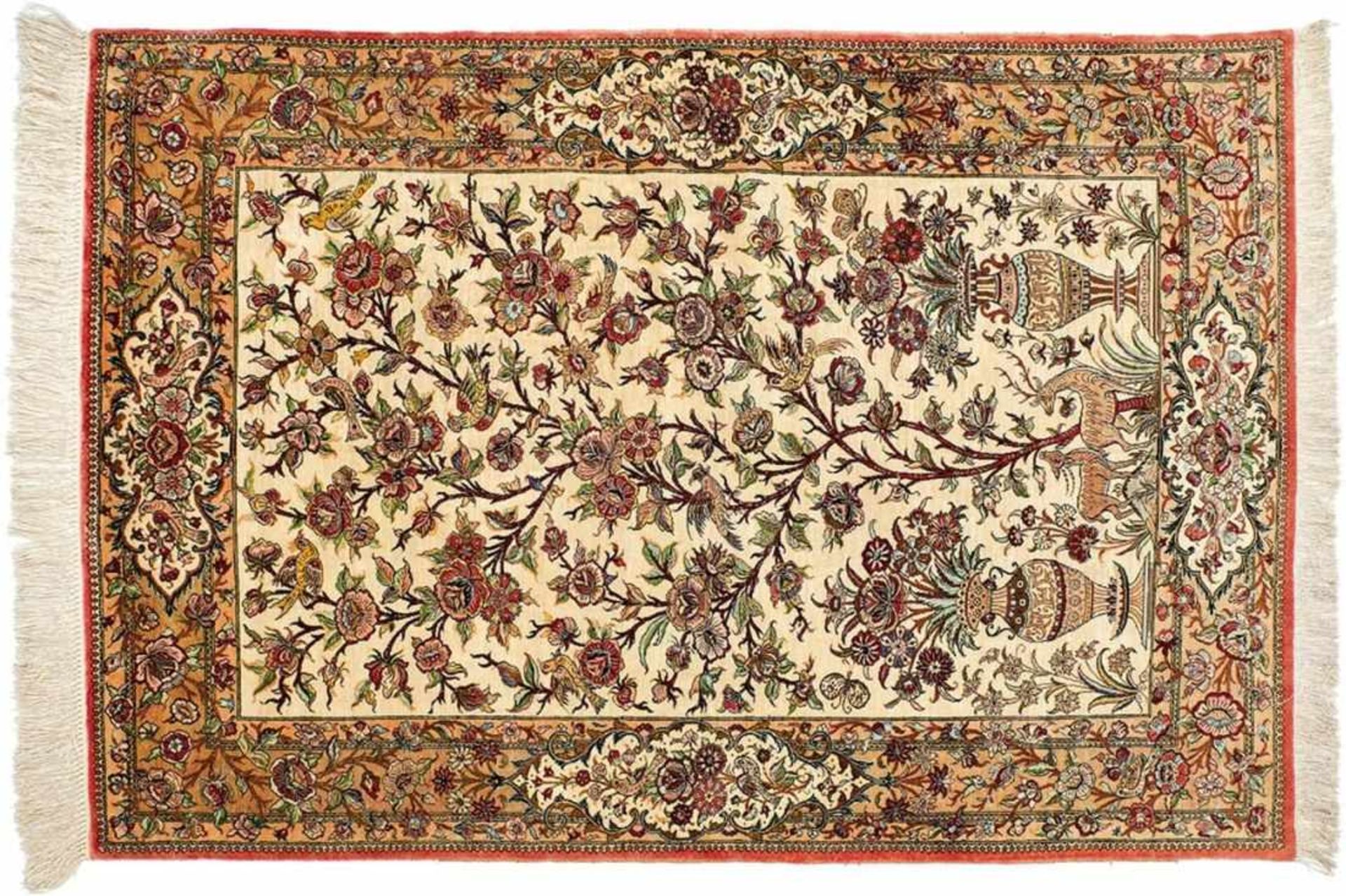 GhomIran, 20th c.In delicate shades of beige, green and red on an ivory ground, border with