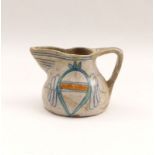 Small JugCentral Italy, around 1500White-ground glazed maiolika painted in blue, yellow and green.