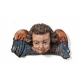 Winged angel's headTyrol, 18th centuryIn front of extended wings semicircular putto head with long