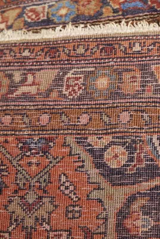 Bijar SandjanIran, 20th c.Red ground with ornaments and flower motifs in blue and beige. Wool. 150 x - Image 3 of 3