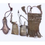 Three powder bottles and one bag18th/19th centuryTwo bottles made of pressed cow horn with