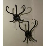 Pair of Thonet coat hooksVienna, around 1900Three s-shaped curved hooks on each profiled, round wall