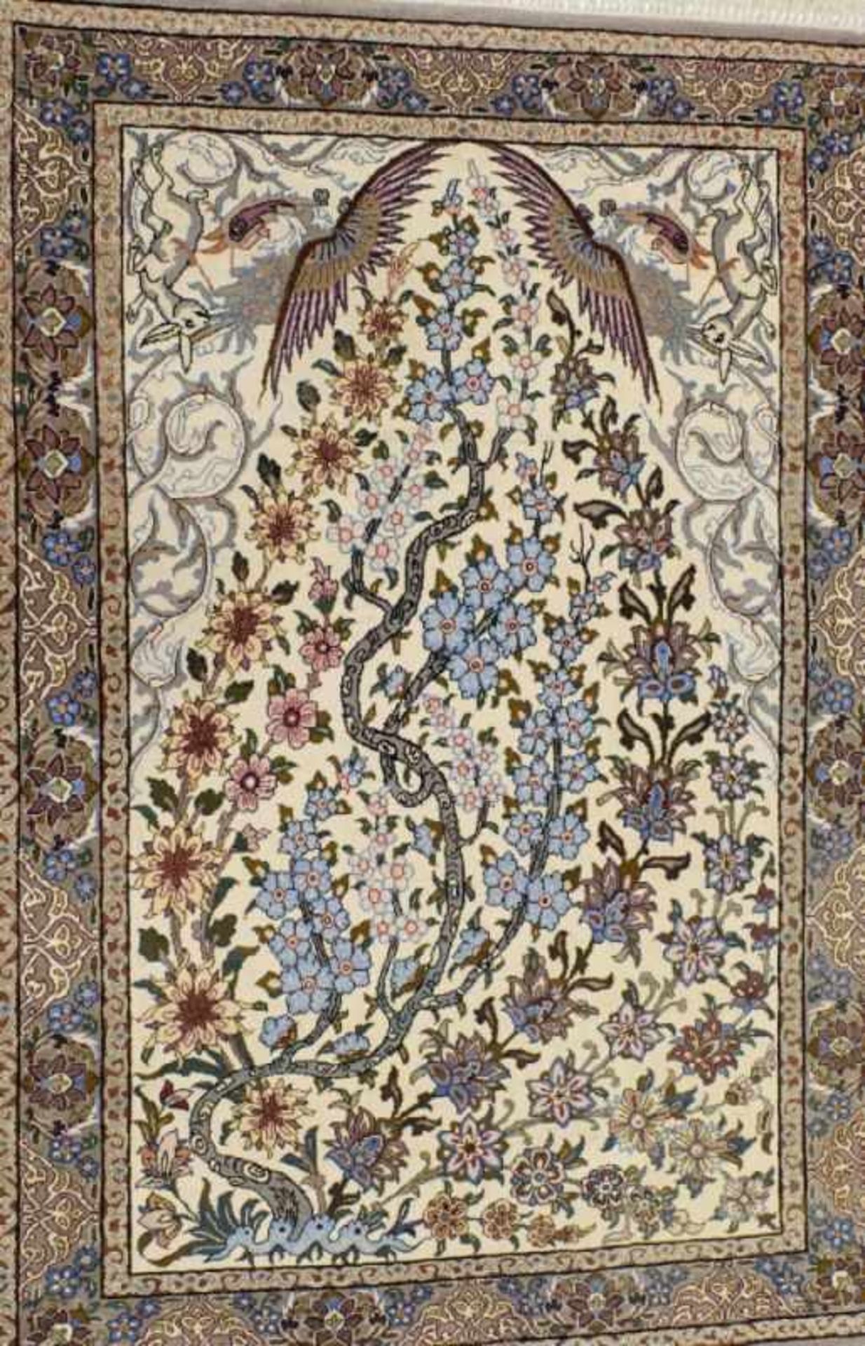 IsfahanIran, 20th c.In soft shades of brown, violet and blue, border with arabesques and flowers,