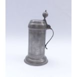 Pewter jugLate 18th centuryCylindrical body over arched, profiled base, arched lid with ball