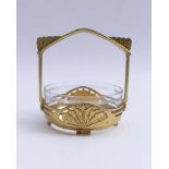 Confectionery bowl in mountGermany, around 1910/20Flat glass bowl with cut decoration in basket-