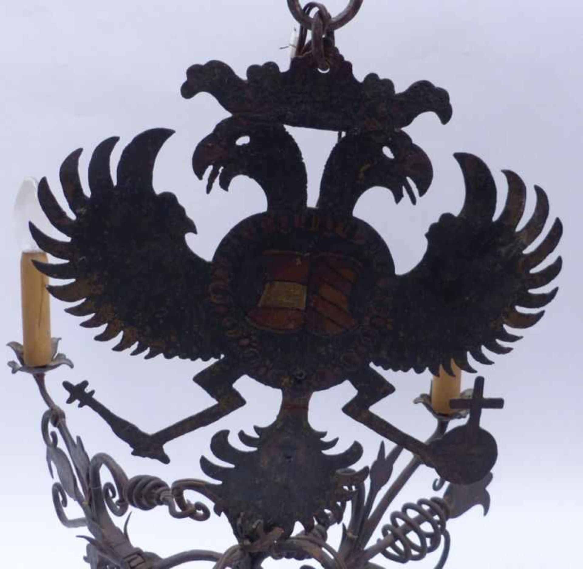 Iron chandelierAustria, 18th/19th c.Suspended with a painted double eagle, four cross-shaped - Bild 2 aus 2