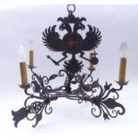 Iron chandelierAustria, 18th/19th c.Suspended with a painted double eagle, four cross-shaped