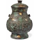 Lid vesselChinaLid with round knob; the wall with archaic decoration in relief. Bronze, gilded,