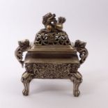 Incense burner with lion (Shizi)China, Qing Dynasty, 19th/20th C.Silver-plated metal. Four-character