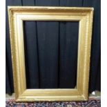 Large Empire frameFrance, 1st half 19th c.Coniferous wood and mass, gilded. Clear dimensions 94 x 70