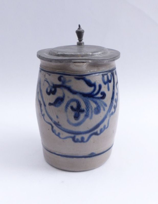 Storage jugWesterwald, 19th c.Belly form with C-handle and vegetable painting in blue. Salt glazed