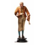 Neapolitan crib figure - Citizen19th centuryOlder man standing on a round pedestal in a yellow