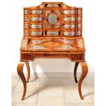 Baroque secretaryMid 18th c.On high curved legs and arched frame the top with tabernacle compartment