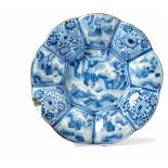 Plate with chinoiserieFrankfurt, around 1700Nine-sided centre with two Chinese in park landscape,