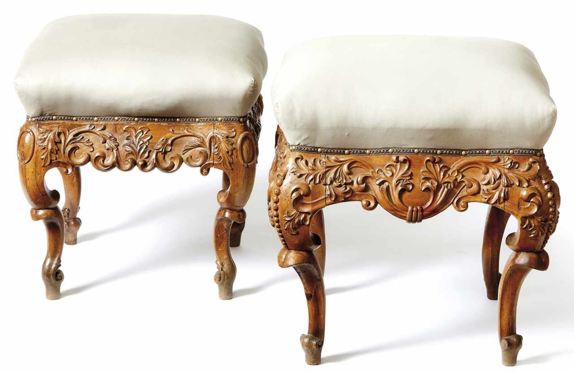 Two baroque tabouretsFranconia, 1st half 18th c.Curved frame with upholstered seat on strongly